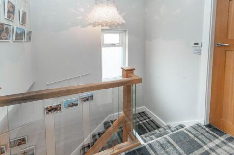 ENTRANCE HALLWAY AND LANDING