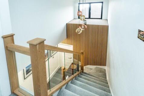 ENTRANCE HALLWAY AND LANDING