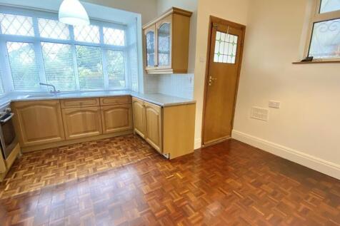 SITTING ROOM AND KITCHEN