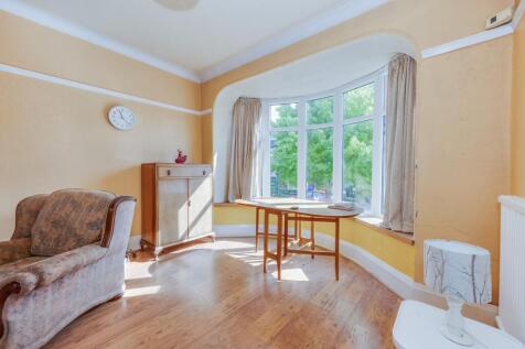 BREAKFAST KITCHEN AND THROUGH SITTING DINING ROOM