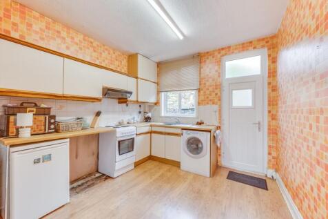 BREAKFAST KITCHEN AND THROUGH SITTING DINING ROOM