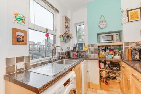 KITCHEN, DINER AND LIVING ROOM