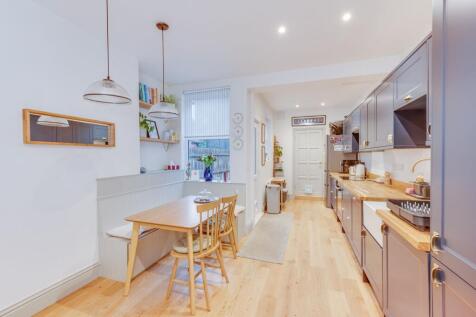 DINER OPENING TO EXTENDED FITTED KITCHEN