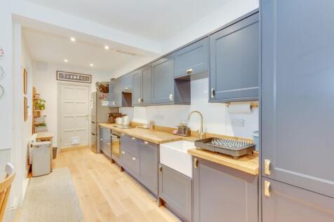 DINER OPENING TO EXTENDED FITTED KITCHEN