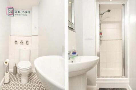 CLOAKROOM AND ENSUITE SHOWER ROOM