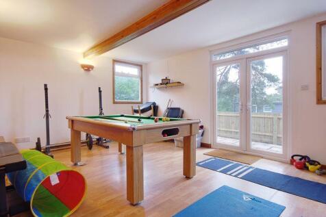 Wood Building (Currently Games Room/Gym)