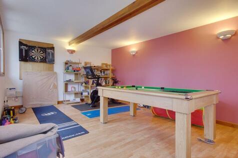 Wood Building (Currently Games Room/Gym)