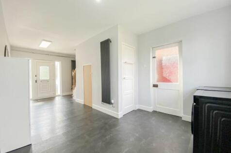 ENTRANCE HALL/UTILITY AREA