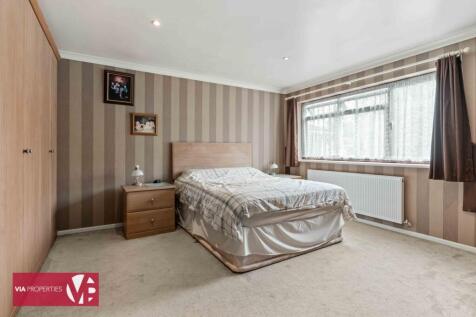 Main bedroom front aspect with fitted wardrobe