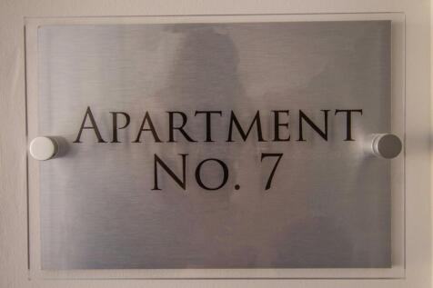Apartment 7, Saddler Court [Apartment Plaque] 01.j