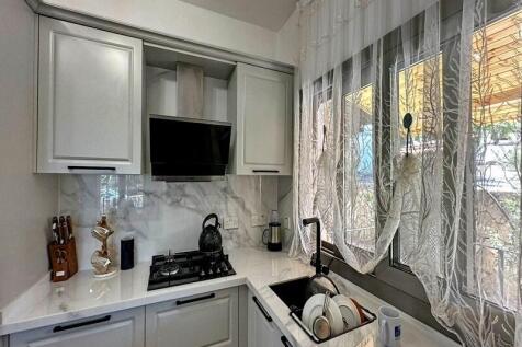 3 bedroom Mediterranean Resale Villa with Swimming pool, Fully Furnished,Central Heating, Solar Panels, Sauna, Fabulous Sea and Mountain views. Image 9999 7