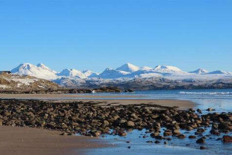 Snowy Torridon mountains from Big Sand Beach.JPG