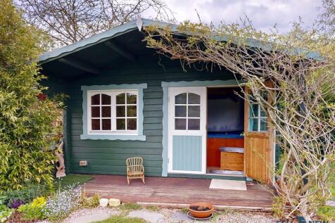 Indoor hot tub shed