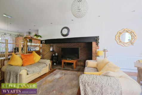 Living Room Showing inglenook Fireplace