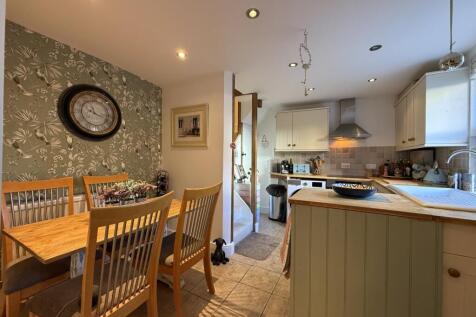 Dining Area to Kitchen