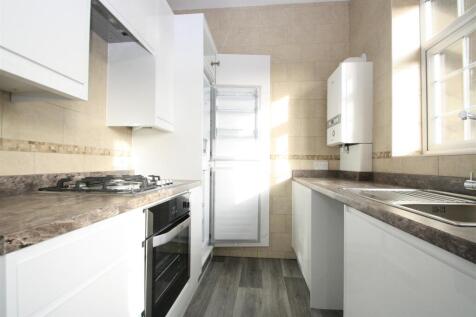 Kitchen with fridge.JPG
