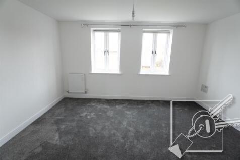 LOUNGE/BEDROOM: