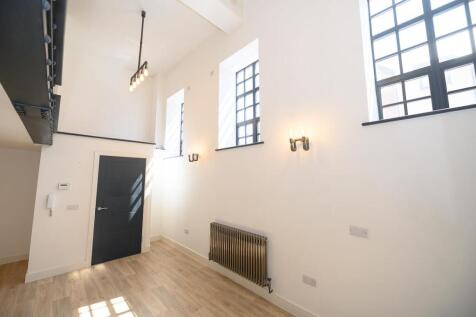 Open plan living area pic 2.jpg