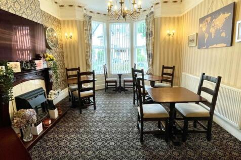 DINING ROOM WITH BAY WINDOW