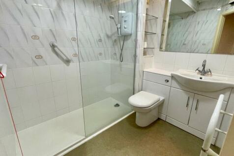 RE-FITTED THREE PIECE SHOWER ROOM