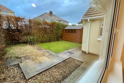 SIDE AND REAR GARDEN