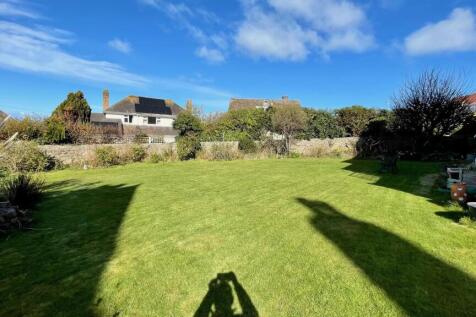SIDE AND REAR GARDEN