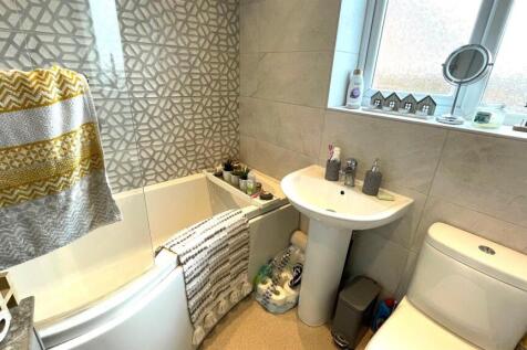 FULLY TILED BATHROOM