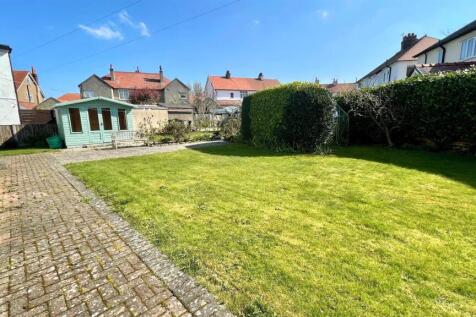 SIDE AND REAR GARDEN