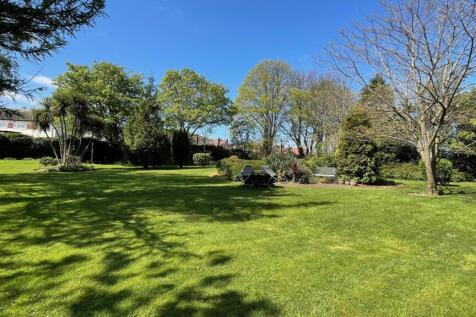 COMMUNAL GARDENS AND PARKING AREA