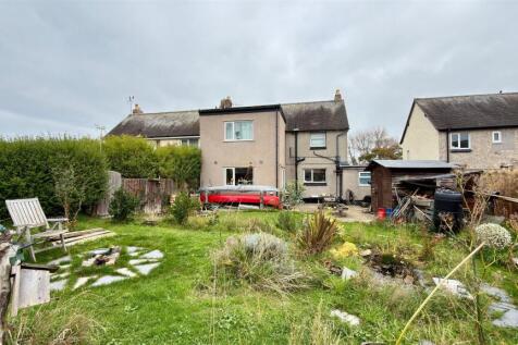 VIEW FROM REAR TO THE HOUSE