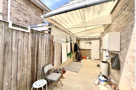 Covered Area To Rear Of Garage