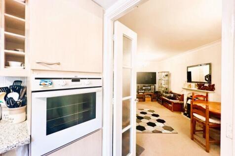 Kitchen View To Living Room