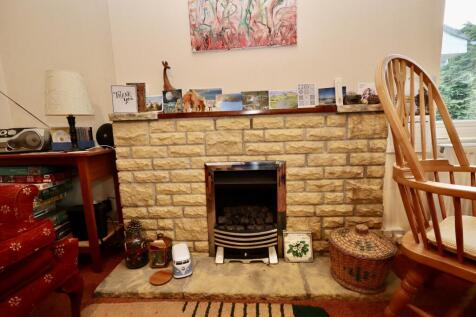 Feature fireplace in the kitchen diner