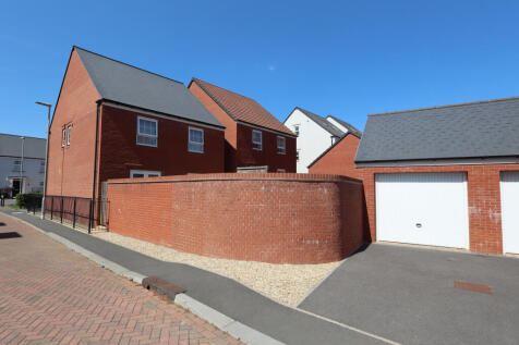 Rear view with garage and parking