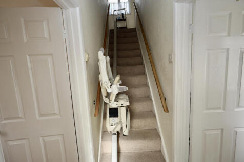 Hall and stairs with stair lift