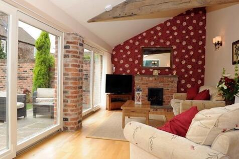 The Byre living room with patio.jpg