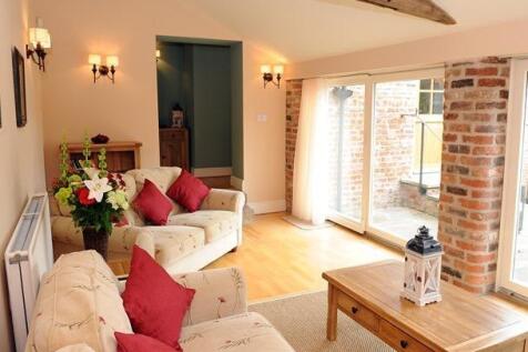 The Byre living room with patio 2.jpg
