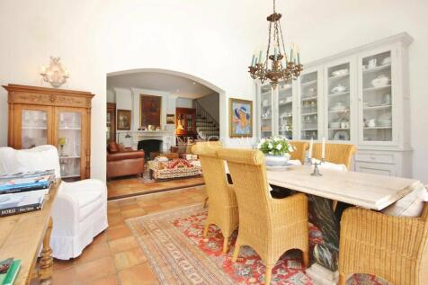Dining room Tile Chandelier Fireplace
