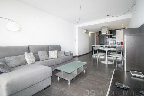 FRONTLINE DUPLEX WITH UNOBSTRUCTED VIEWS OF THE SEA AND MOUNTAINS 