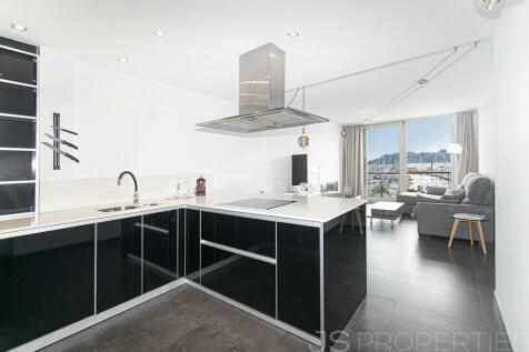 FRONTLINE DUPLEX WITH UNOBSTRUCTED VIEWS OF THE SEA AND MOUNTAINS 