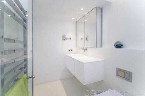 RENOVATED MODERN FRONT LINE APARTMENT FOR SALE WITH UNOBSTRUCTED VIEWS OF THE SEA