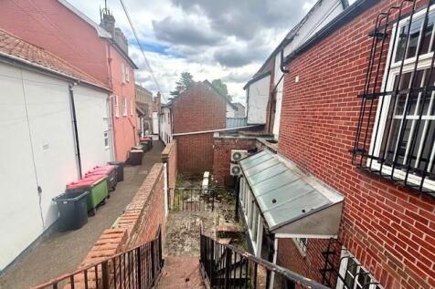 Rear yard to alleyway.jpg
