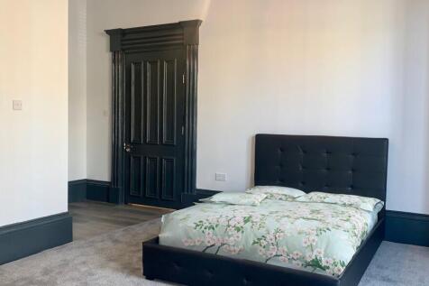 bedroom with green b