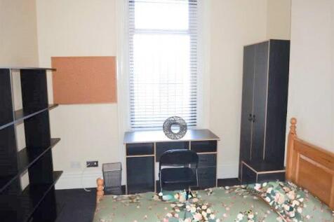 bedroom with green b