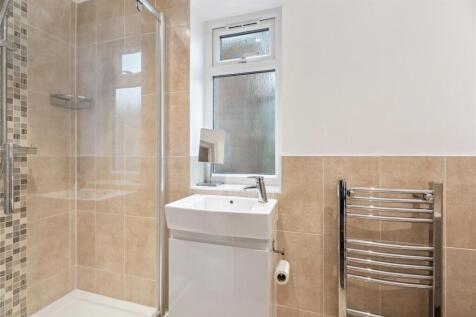 Cloaks/Shower Rm