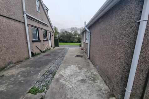 PARKING SPACES AND GARAGE