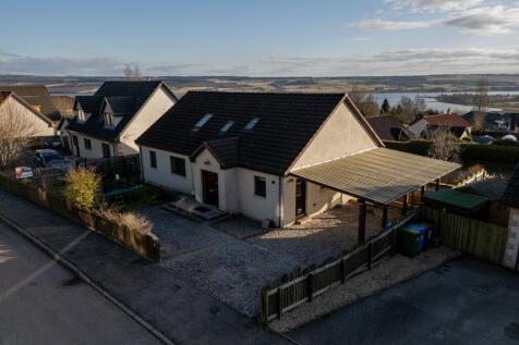 Rear And Driveway