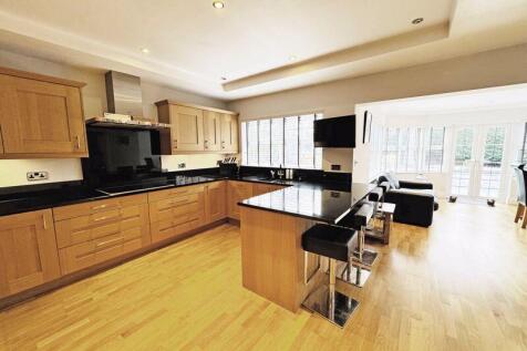 KITCHEN OPENING INTO SITTING ROOM
