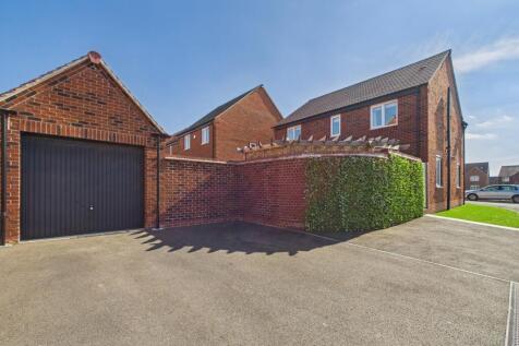 Rear Driveway and Garage