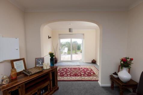 Sitting Room leading into Dining Room